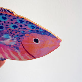 Close up of a large wooden fish decoration by Lee Foster-Wilson showing off the wood grain