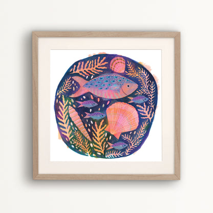 Art print of a colourful fish and shells painting by Lee Foster-Wilson displayed in a wooden frame