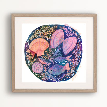 Mixed media painting of colourful fish and shells by Lee Foster-Wilson displayed in a wooden frame